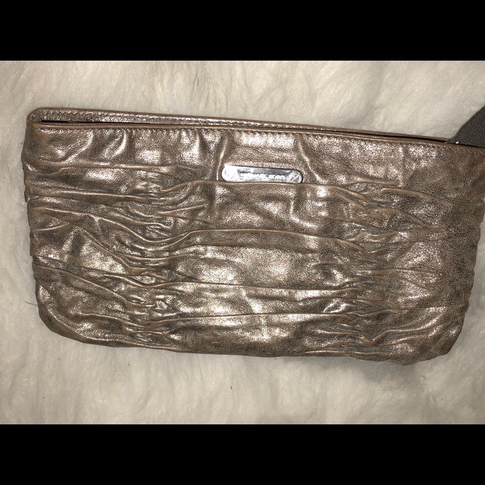 Michael Kors metallic platinum clutch 👛👑